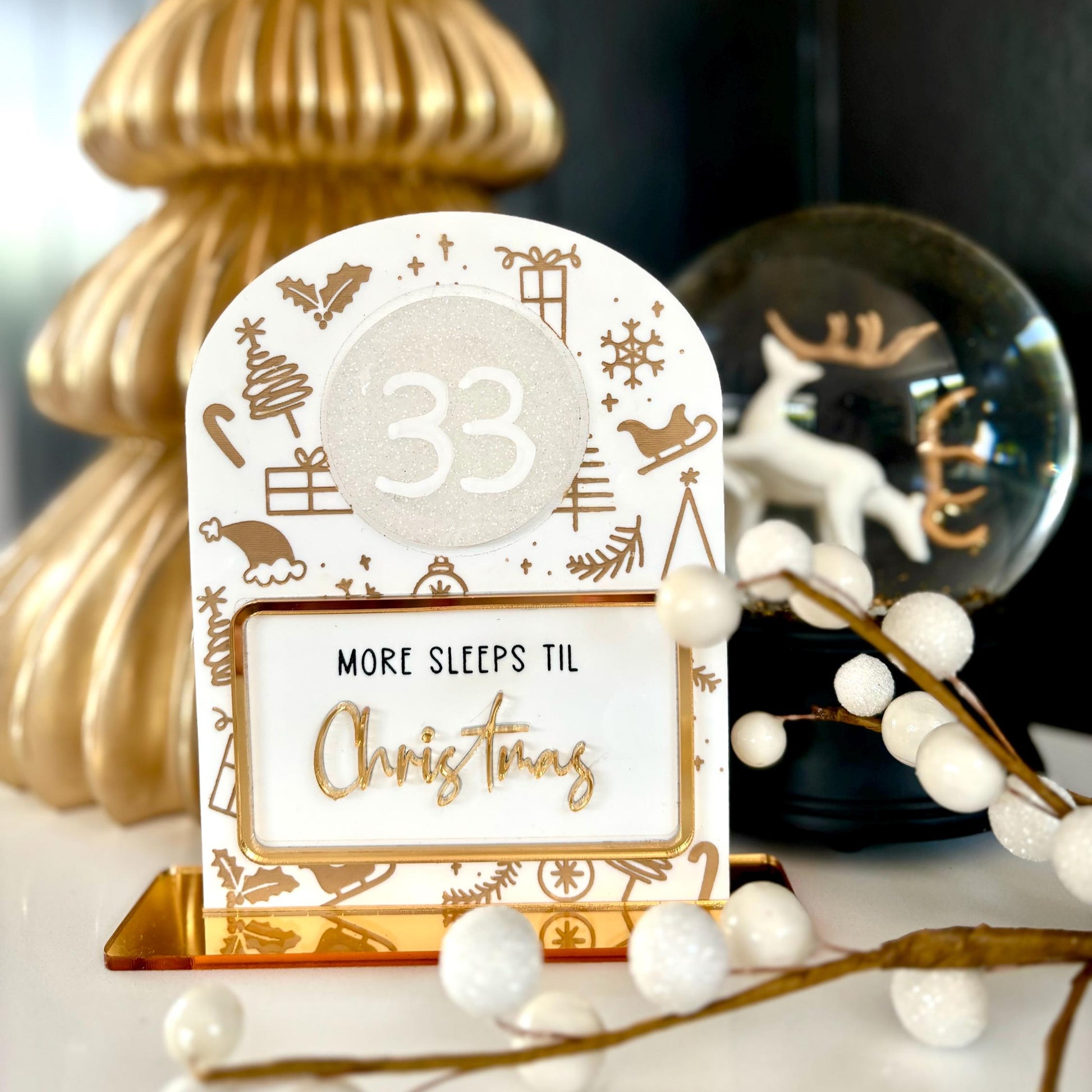 Christmas countdown sign with gold tree and decorative elements