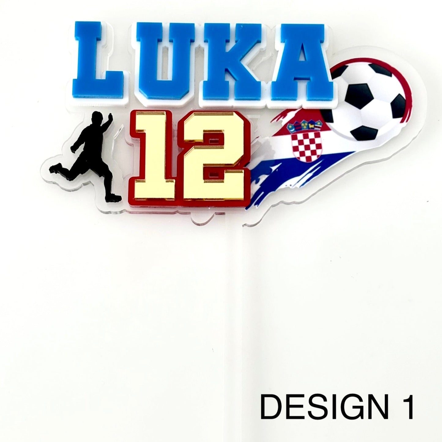 Personalised soccer-themed name and number cake topper with a player silhouette, soccer ball, and Croatian flag on a clear background.