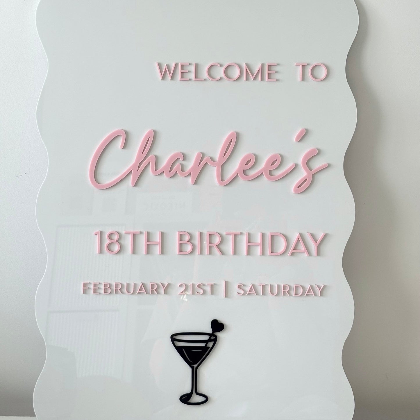 A2 Acrylic Sign for Charlee's 18th birthday with a cocktail icon on a white background