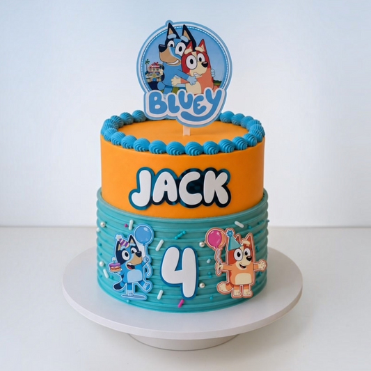 Personalised Bluey cake topper with custom name Jack, age 4 and matching Bluey acrylic cake side charms on a birthday cake.