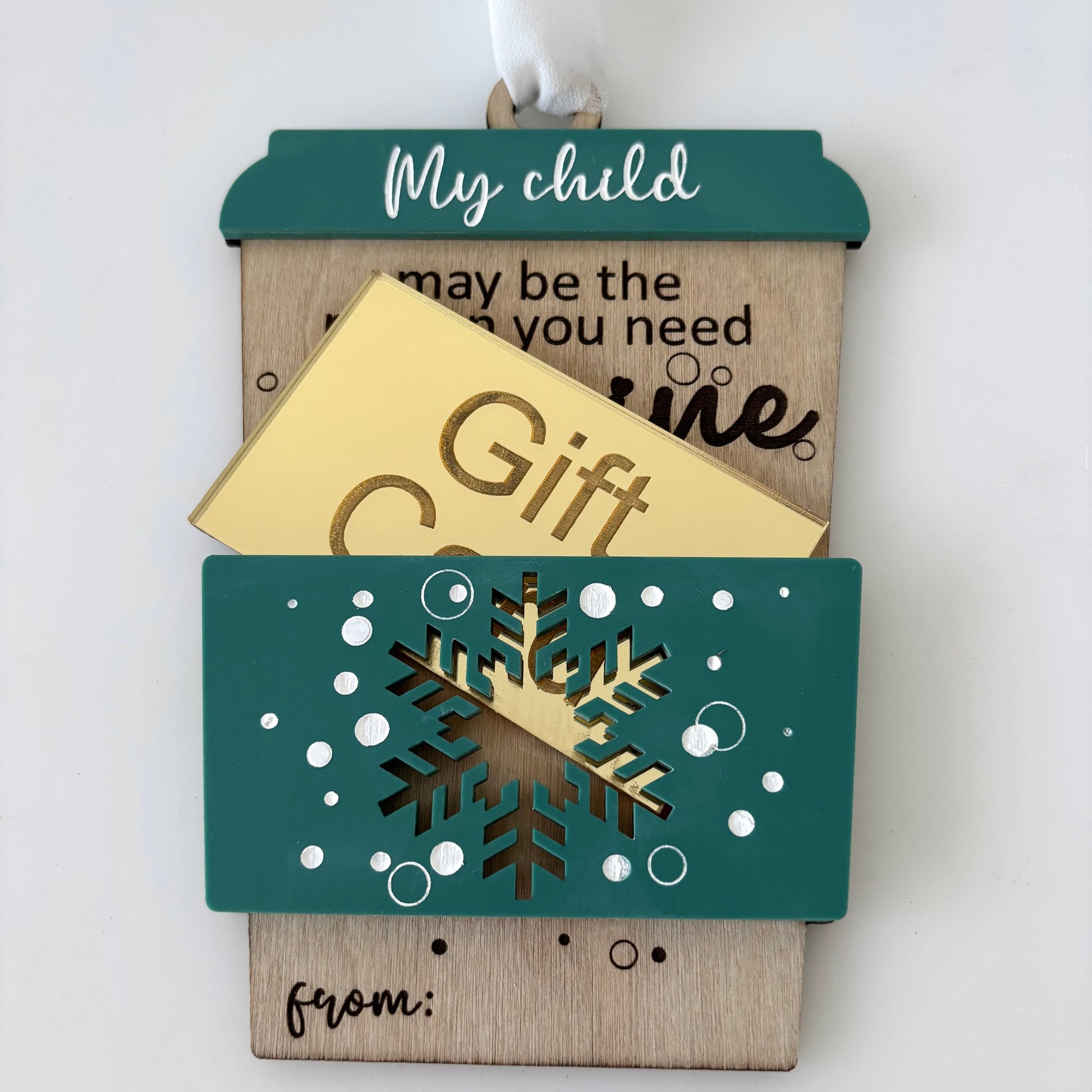 Wooden gift card holder with decorative elements on a white background