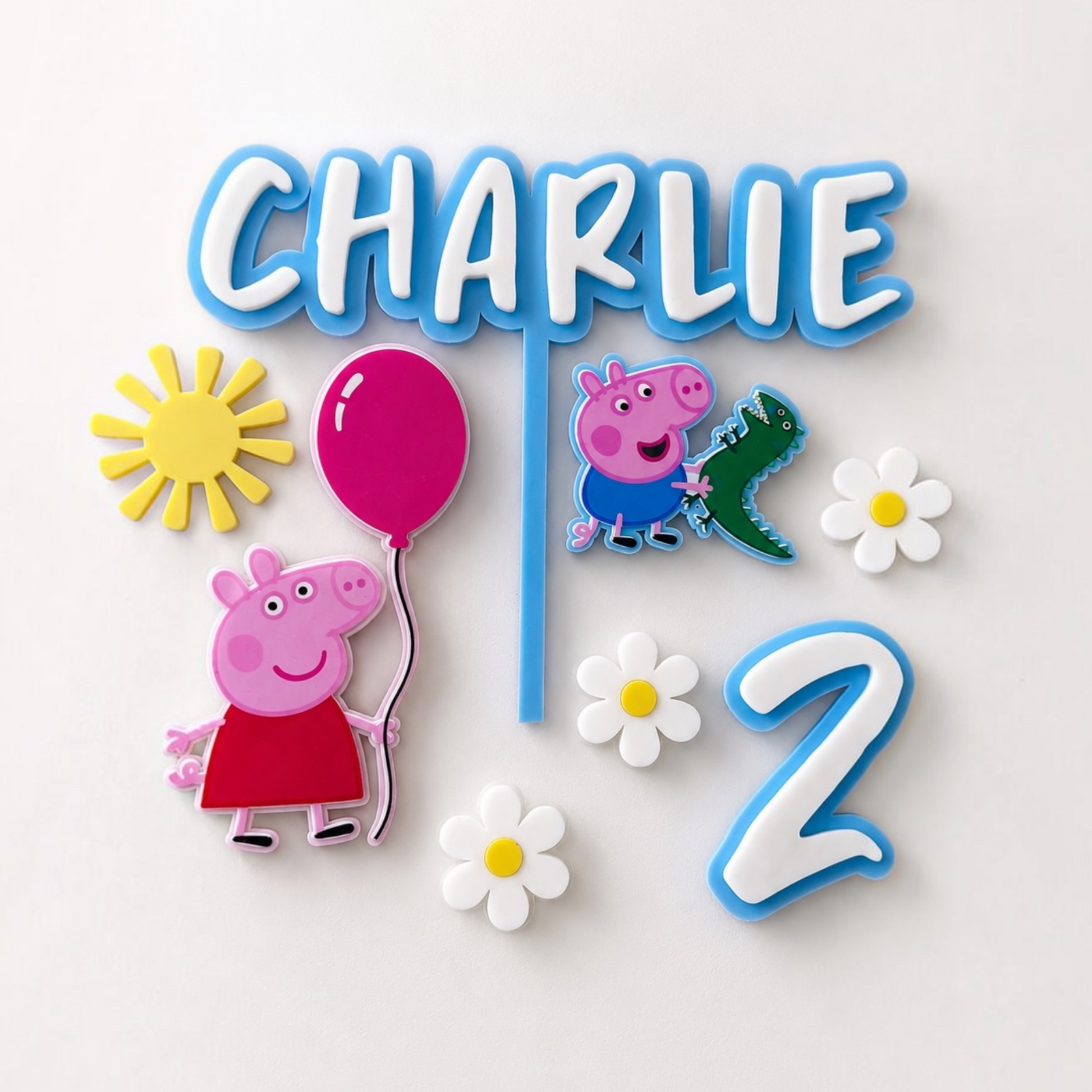 Personalized Peppa Pig birthday wall sign for Charlie, featuring the name CHARLIE in blue-outlined white letters, a blue pole, a pink balloon, Peppa Pig character cutouts, white daisy flowers, a yellow sun, and a blue-outlined number 2 on a white background.