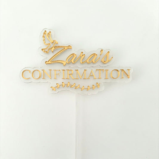 Gold 'Zara's Confirmation' Acrylic Cake Topper on a white background.