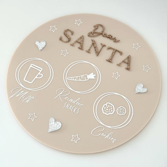 Round acrylic board with 'Dear Santa' and Christmas-themed items on a white background