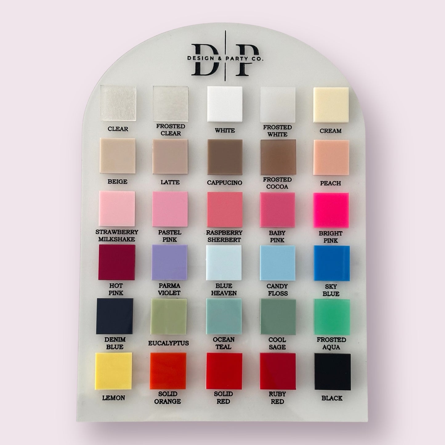 Color swatch card with various color samples on a light gray background