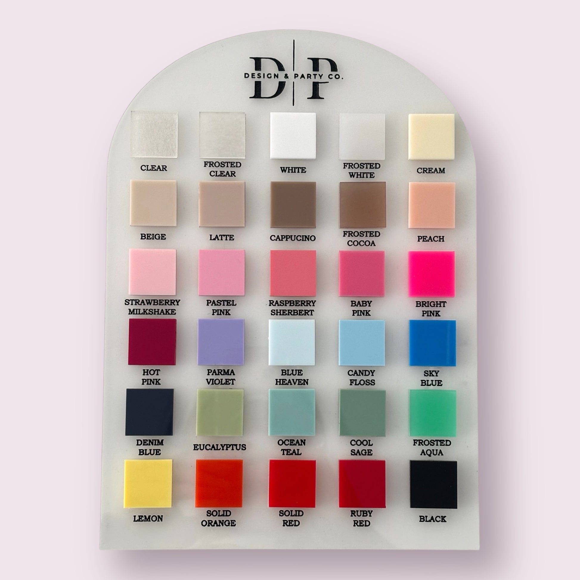 Color swatch card with various color samples on a light gray background
